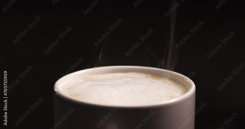coffee cup or tea cup with natural steam smoke. Close-up of Smoke rises from cup, cup of coffee for breakfast in the morning time with warm light. Hot Coffee Drink Concept. coffee cup or tea cup with natural steam smoke. Close-up of Smoke rises from cup, cup of coffee for breakfast in the morning time with warm light. Hot Coffee Drink Concept.