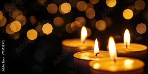 candles in the dark with bokeh blurred background