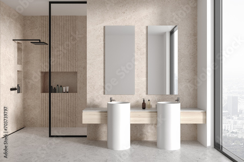 White and stone bathroom with double sink and shower