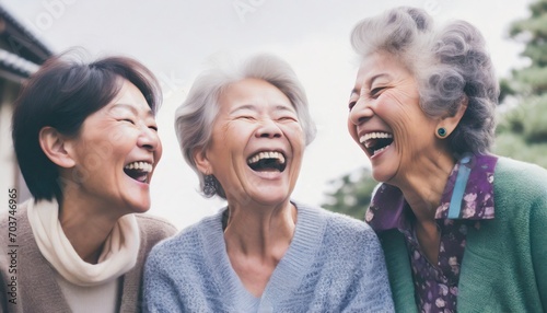 大笑いするシニア女性たち
 photo