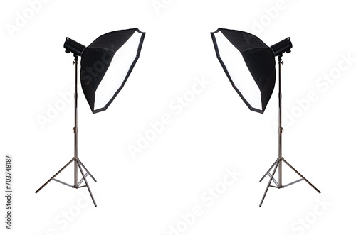 Softbox with flash on tripod stand isolated on white background.