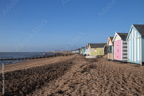 Boats and beach huts on Thorpe Bay beach, Southend-on-Sea, Essex, England, United Kingdom photo