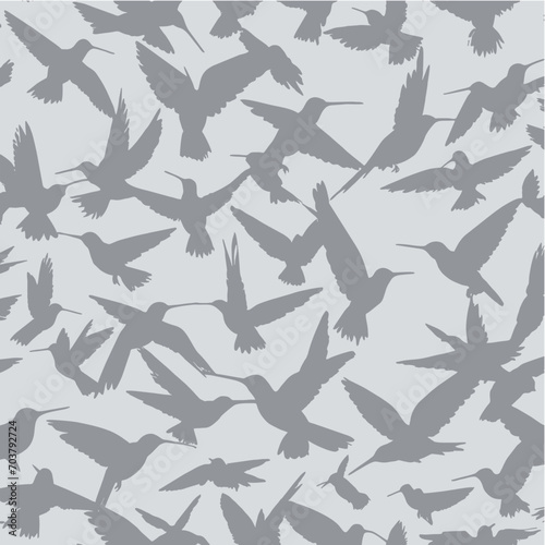 Seamless pattern with flying hummingbirds