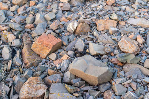 imagen detalle textura suelo de piedras de distintos tamaños photo