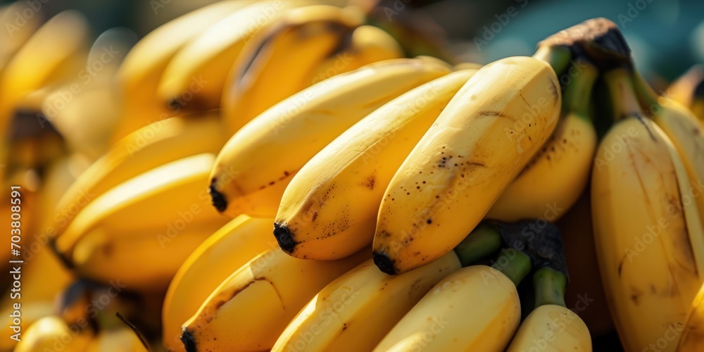 An image capturing the vibrant and fresh display of yellow bananas, creating a visually appealing background with the natural beauty of the fruit.