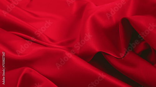 Red silk satin background. Wavy soft folds on shiny fabric. Luxurious dark red background. Valentine, Christmas, Anniversary, Black Friday. Web banner.