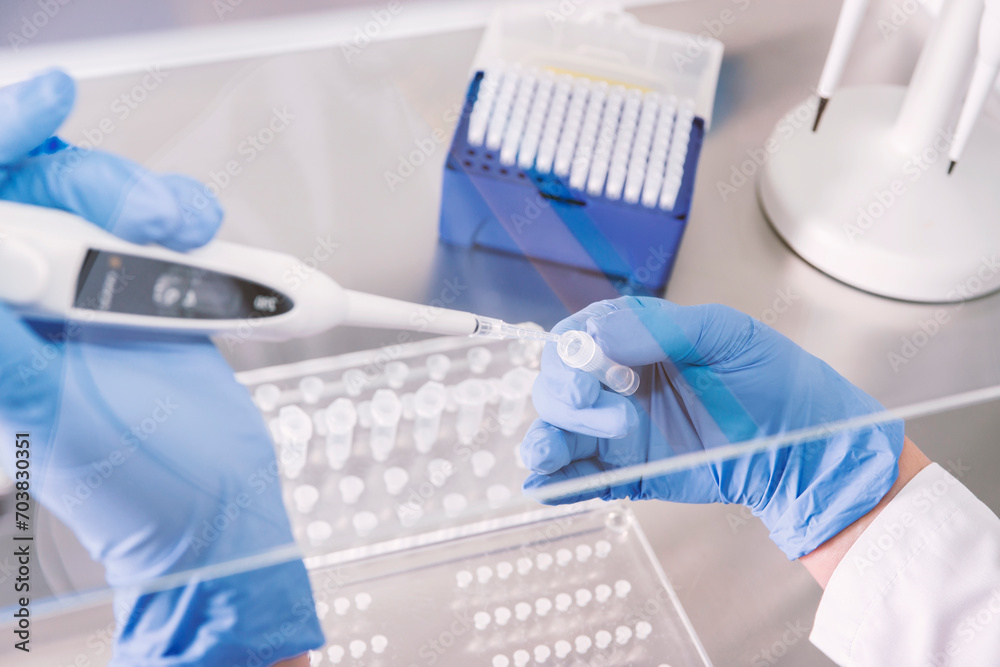 Scientist working with blood sample in laboratory.A blood test result for the new rapidly spreading Corona virus pandemic concept.Coronavirus vaccine development