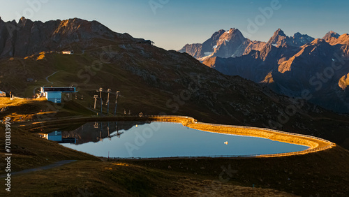 Fototapeta Naklejka Na Ścianę i Meble -  Alpine summer morning view with reflections in a lake at Mount Sechszeiger, Jerzens, Imst, Tyrol, Austria