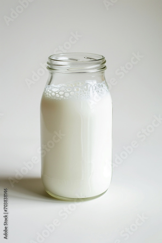 Glass jar of milk cream isolated on white. AI Generative