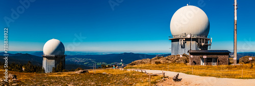 High resolution stitched summer panorama with two radar antenna domes at Mount Arber, Bayerisch Eisenstein, Bodenmais, Bavaria, Germany photo