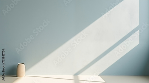 Minimalistic pastel blue gentle background. Empty space of room, product display