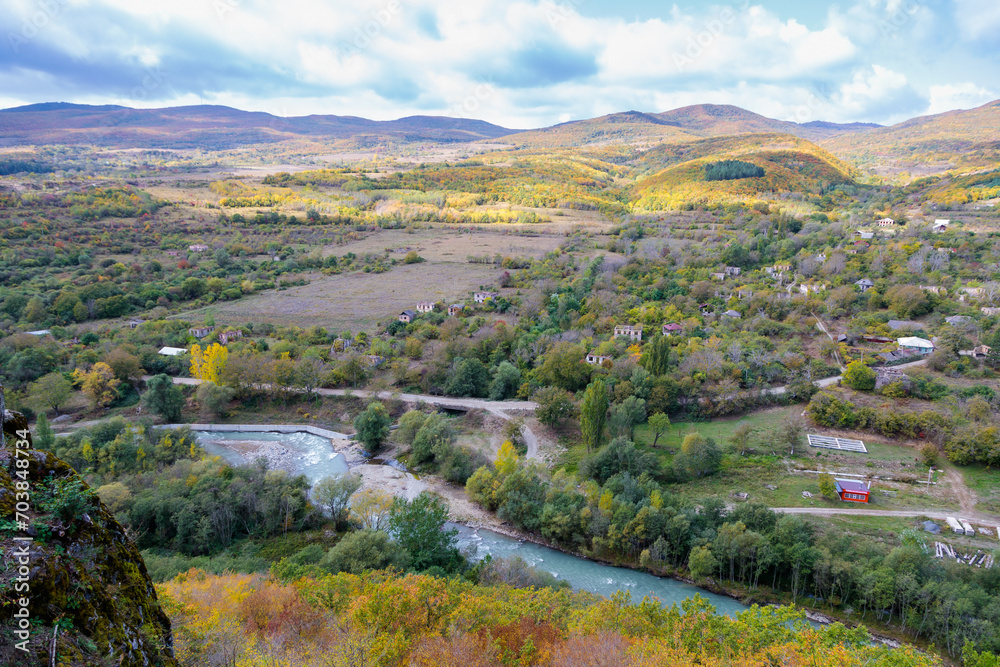 View of a mountain river from the height of the mountains