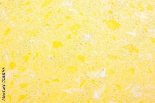 yellow marble with light speckles