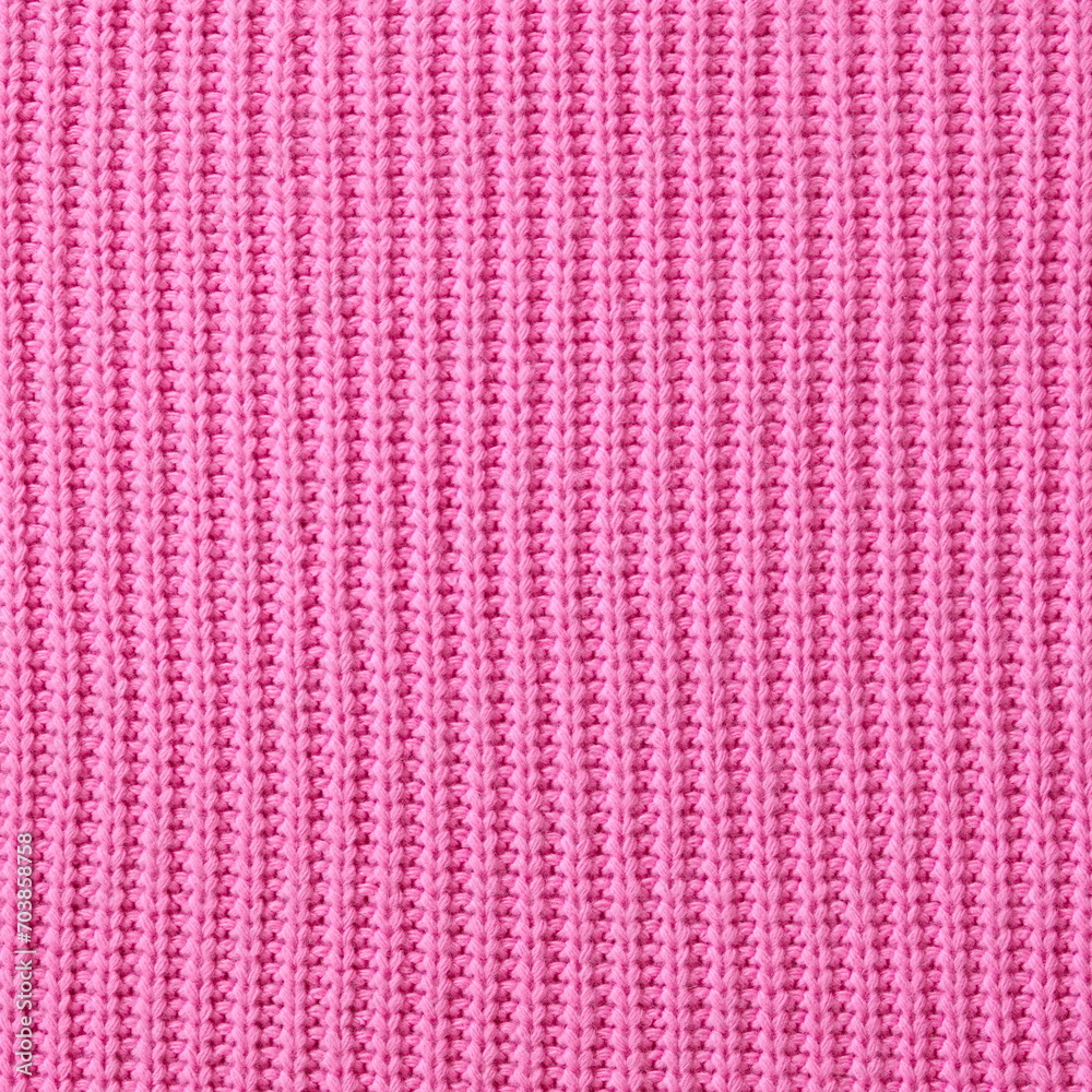Pink knitted texture background. Knitted fabric. Abstract background
