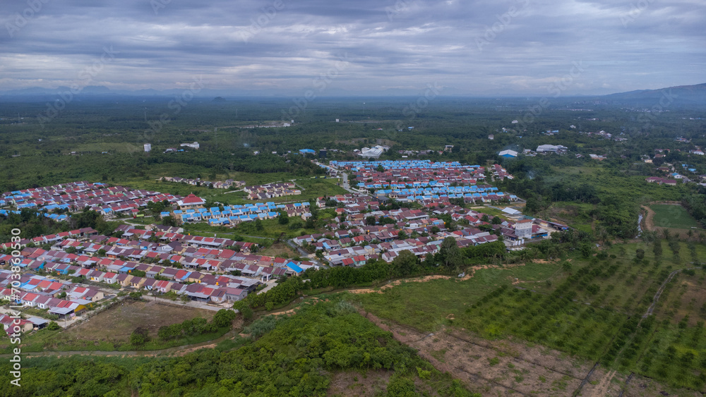 Aerial view of subsidized housing (KPR) on a wide and green land
