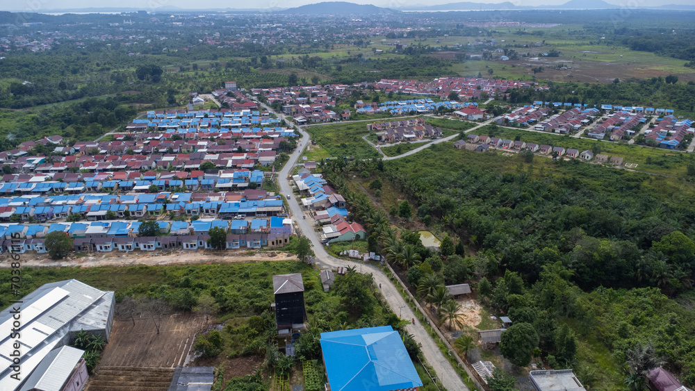 Aerial view of subsidized housing (KPR) on a wide and green land
