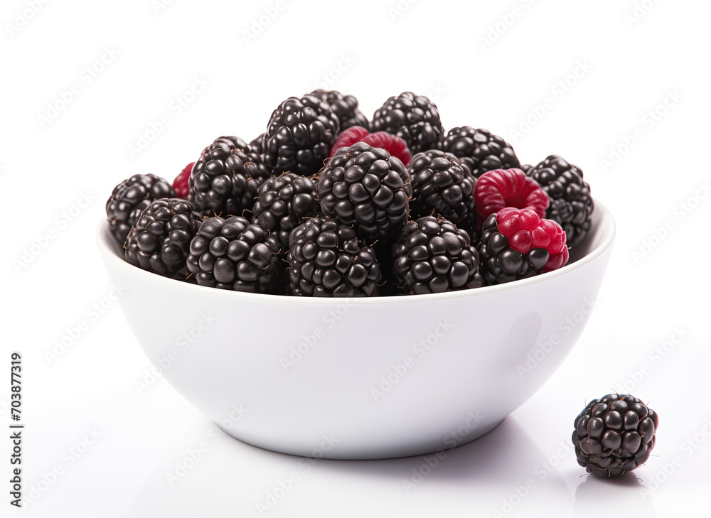 A vibrant mix of ripe blackberries and raspberries displayed in a white bowl, isolated on a white background, showcasing their natural juicy texture and color. A vibrant mix of ripe blackberries and raspberries displayed in a white bowl, isolated on a white background, showcasing their natural juicy texture and color.
