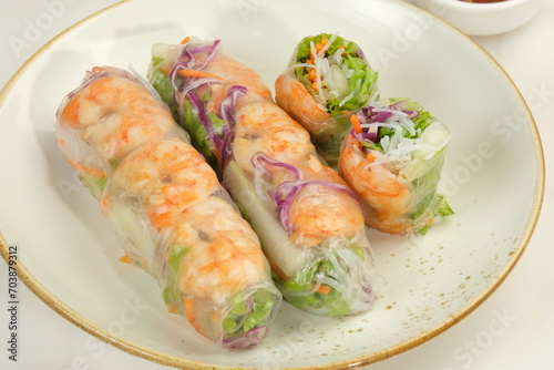 Fresh Spring Rolls With shrimp in Rice Paper. Rice Paper Rolls With Shrimp, Rice Noodles,Vegetable Salad and Sauce.