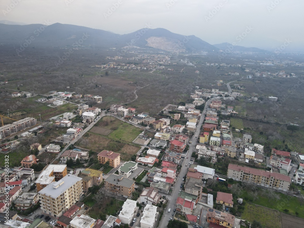 A panoramic view of a small town, nestled in the mountains, in southern Italy