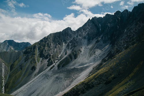 Space of mountainous terrain with clouds 