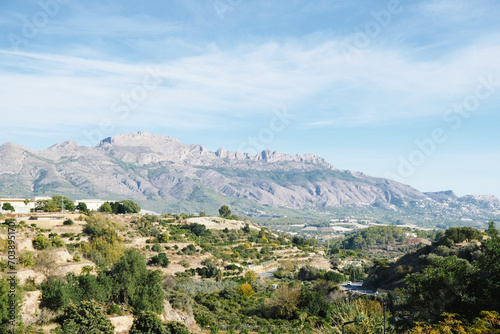 View from beautiful La Nucia town to surrounding mountains and hills. Landscape in Alicante Province, Spain © vejaa