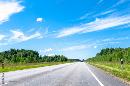 A road in summer on a section of the Parnu–Rakvere–Someru road, part of the Estonian national highway 5 photo
