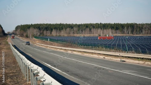 Solar power plant near the highway in Ukraine. Green energy