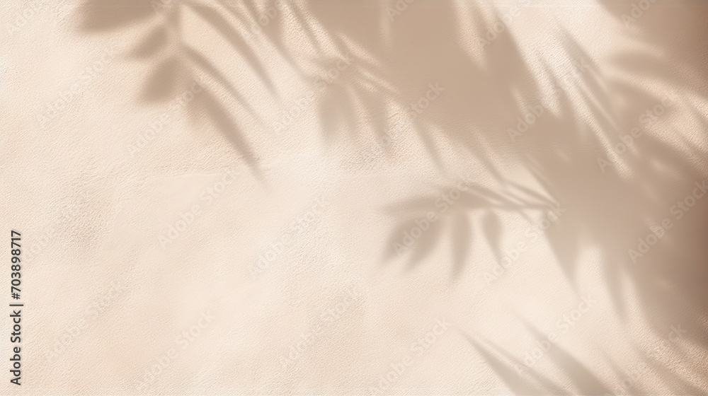 Beautiful texture of beige brown luxury, smooth stucco wall with soft foliage dappled light of tropical tree leaf shadow - obrazy, fototapety, plakaty 