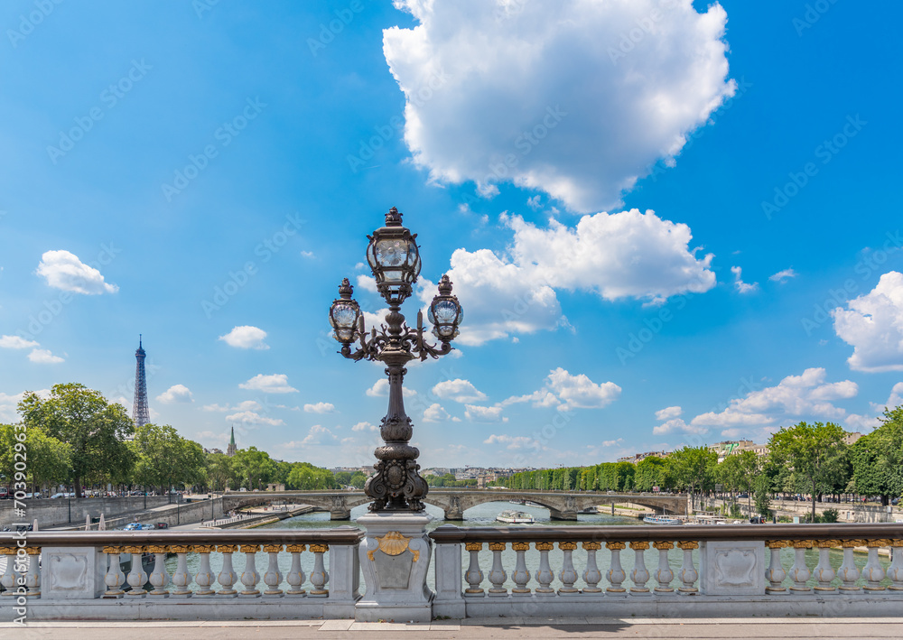 Lamppost in Alexander III bridge with Eiffel tower on the background