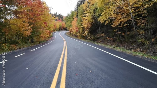 The road crossing the Mauricie National Park during the autumn color (Shawinigan, Quebec, Canada)