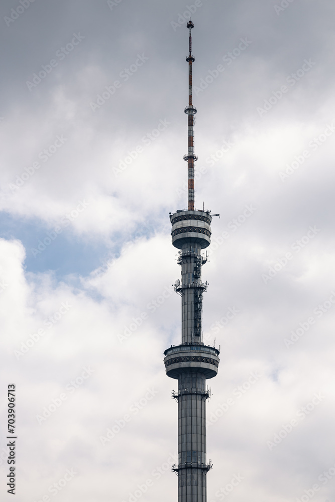 Koktobe Television and radio broadcast tower in Almaty, Kazakhstan. TV towers against the background of a cloudy sky.