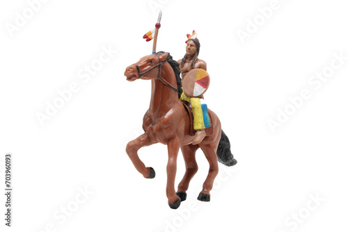 Native american , vintage toy warrior on horseback with spear and shield, on transparent background, 