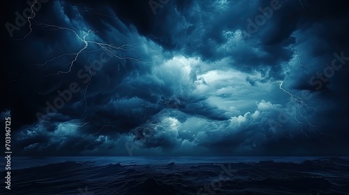 Black dark greenish blue dramatic night sky. Gloomy ominous storm rain clouds background. Cloudy thunderstorm hurricane wind lightning. Epic fantasy mystic. Or creepy spooky nightmare horror concept