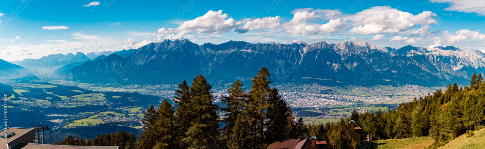 High resolution stitched alpine summer panorama with the city of Innsbruck in the background at Mount Patscherkofel, Tyrol, Austria - obrazy, fototapety, plakaty 