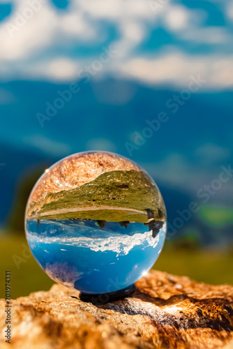 Crystal ball alpine summer landscape shot at Mount Patscherkofel, Innsbruck, Tyrol, Austria © Martin Erdniss