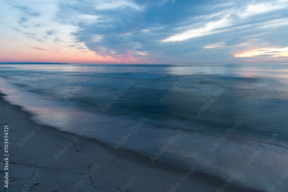 The silent sea in long exposure at sunset