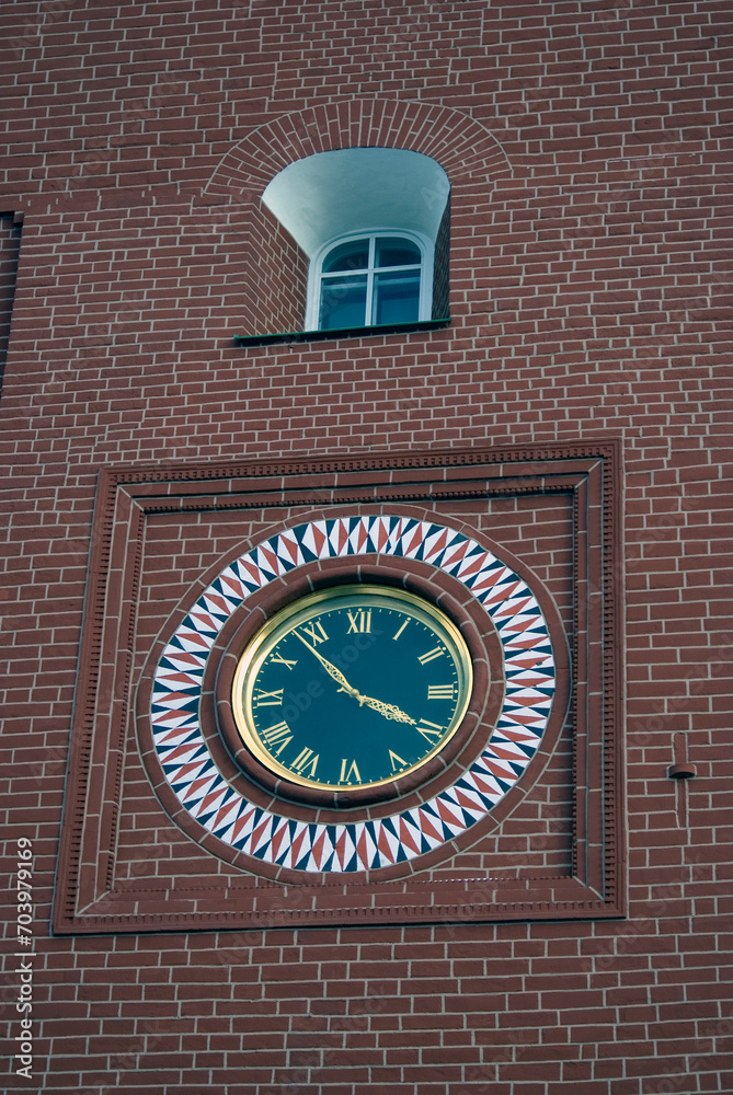 Clock on the wall of Moscow Kremlin tower