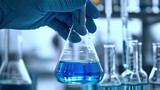 Science and Chemistry. A scientist in a laboratory analyzes a blue substance in a test tube. Medical research for pharmaceutical discoveries, development of biotechnology in healthcare.