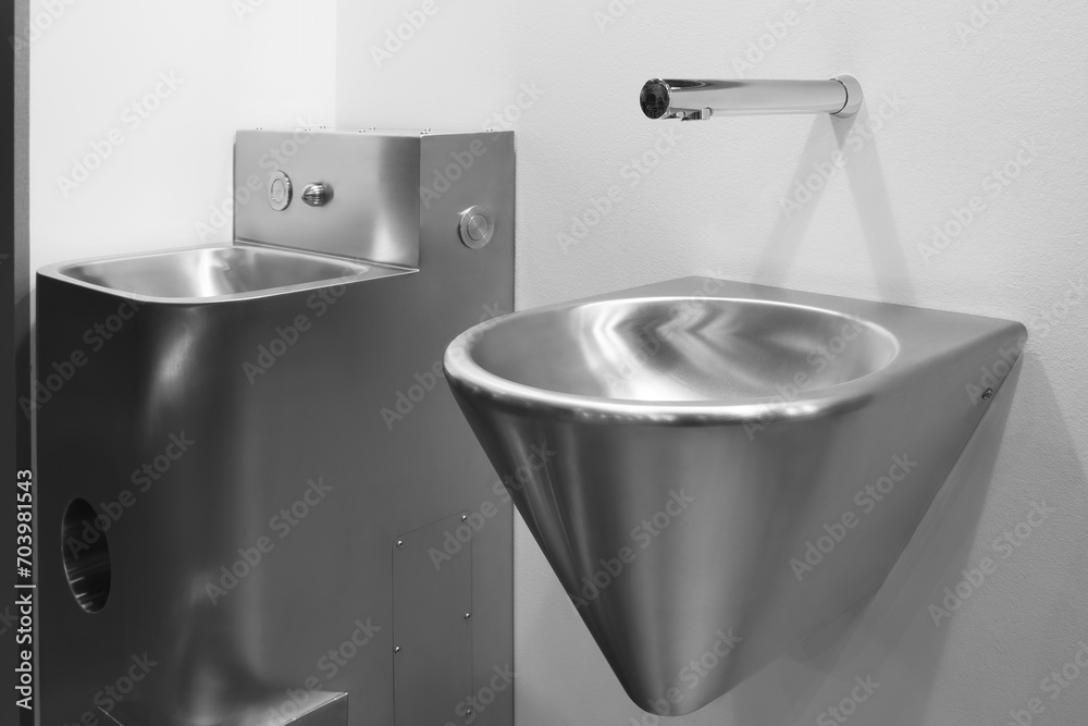 Fototapeta premium Stainless steel bathroom public toilet interior