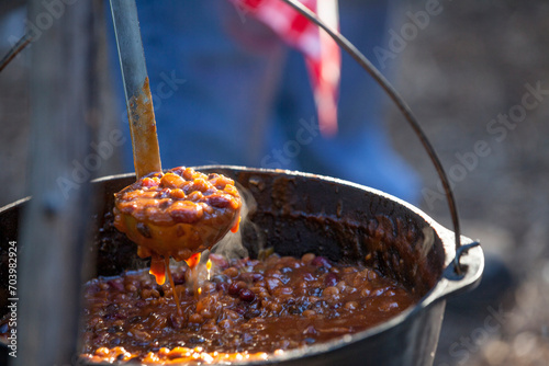 Camp Beans over an outdoor camp fire.