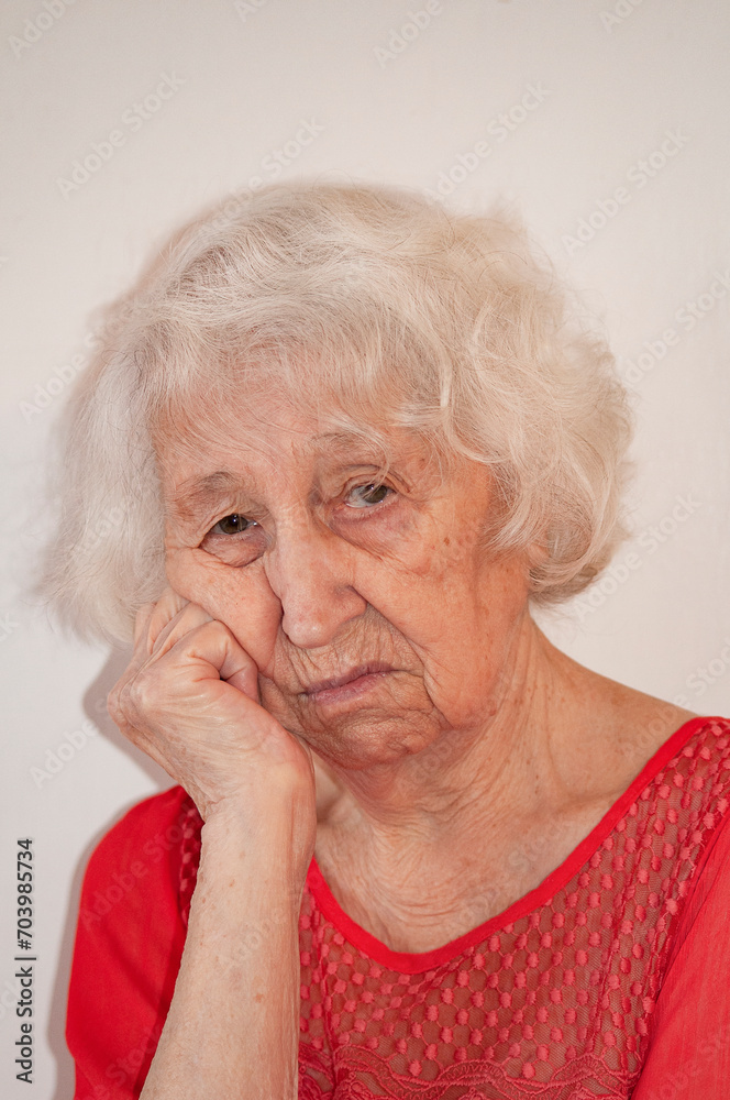 Head shot close up portrait thoughtful senior aged retired woman worrying about personal health problems. Upset older female retiree thinking of family troubles, feeling lonely, sitting at home. Head shot close up portrait thoughtful senior aged retired woman worrying about personal health problems. Upset older female retiree thinking of family troubles, feeling lonely, sitting at home.