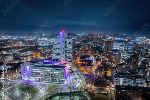 Wallpaper Mural Leeds city centre at Night. Yorkshire city of Leeds after dark with city centre lights of offices, apartments and retail. Aerial view from near the train station Torontodigital.ca