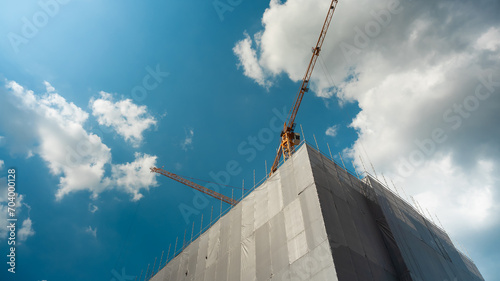 Crane and highrise construction site