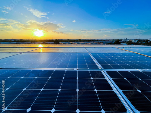 Aerial solar panel and sunset.