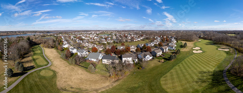 Aerial panoramic view of residential neighborhood and golf course in Powell, Ohio, USA.  November 24, 2023. photo