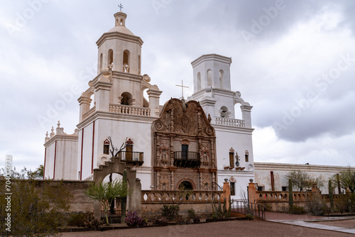 San Xavier del Bac Mission, Tohono O'odham Reservation, Tucson in Pima County, Arizona, on a cloudy day