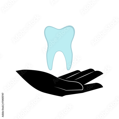 The tooth is held by a hand. Silhouettes.