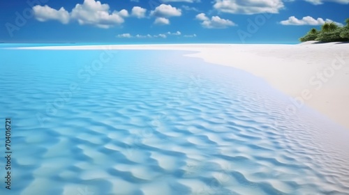  a large body of water sitting on top of a sandy beach next to a lush green tree covered island in the middle of a blue sky filled with white clouds.