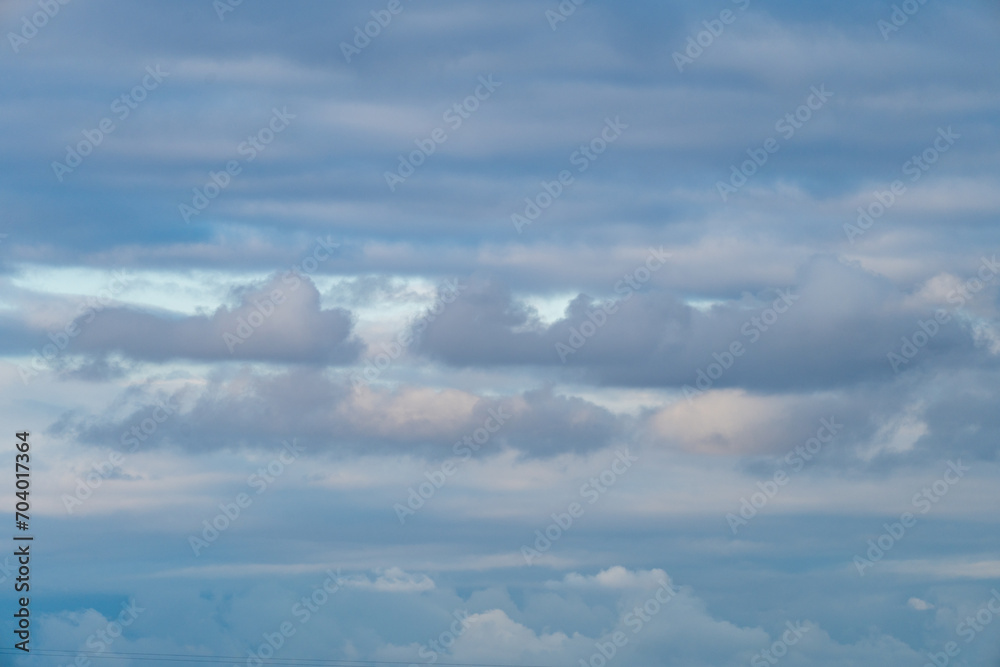 Colorful sky with dark clouds and blue sky, at dusk Colorful sky with dark clouds and blue sky, at dusk