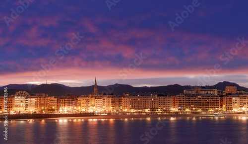 San Sebastian. Sunrise over La Concha Bay and the city of Donostia San Sebastian, Basque Country.